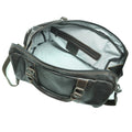 Open brown leather bag on a white background