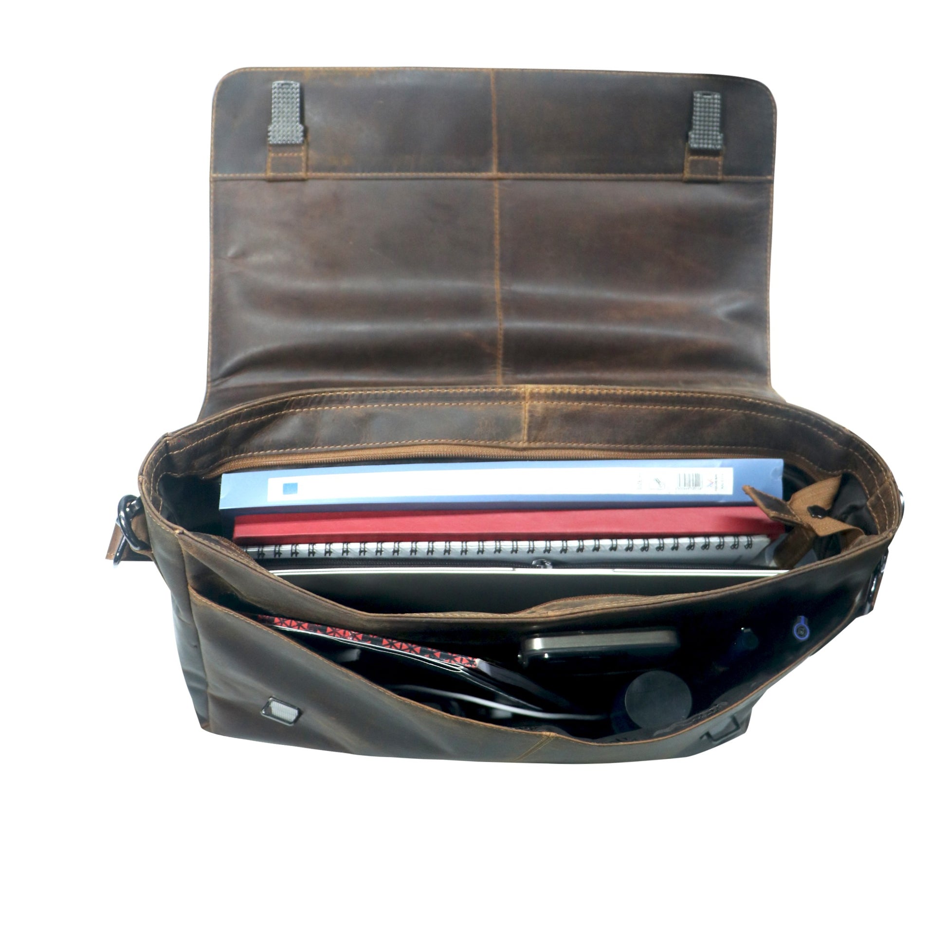 Brown leather briefcase with open lid showing interior compartments on a white background