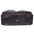 Brown leather duffel shoulder bag bottom view