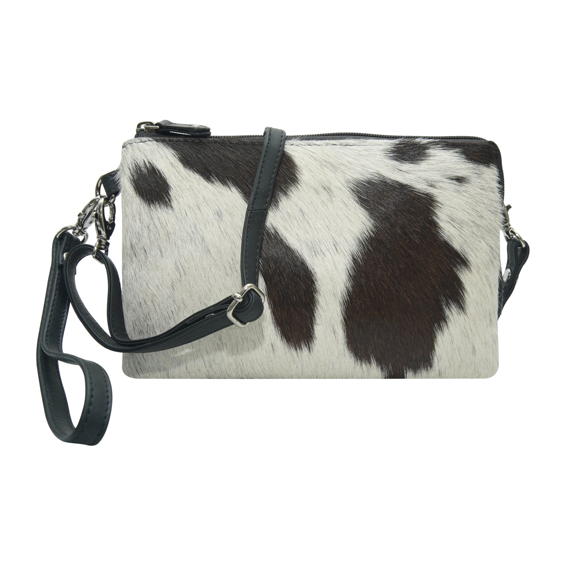 Black and white cow print small crossbody with a strap front view