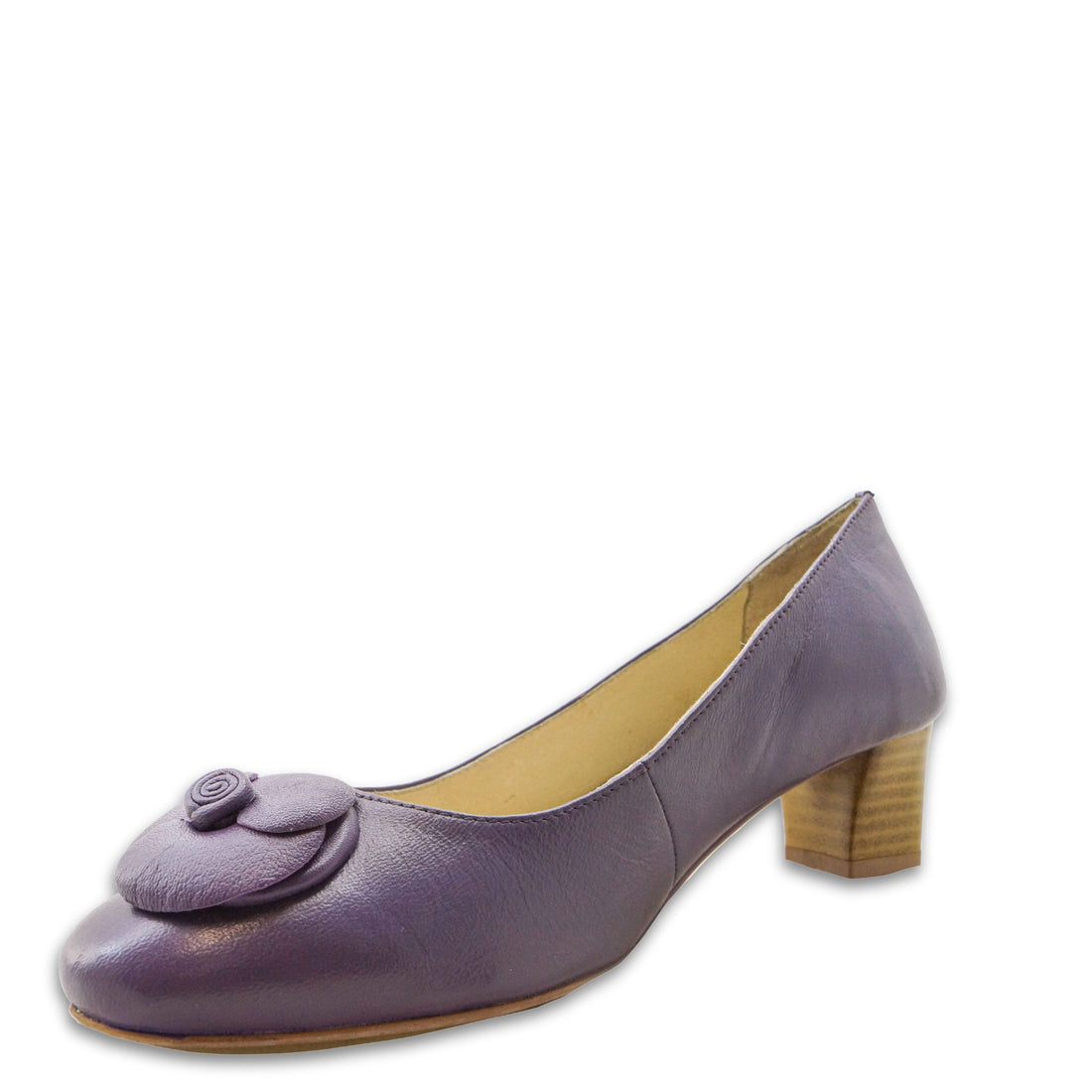 A pair of purple ladies' heels with a floral design on the top