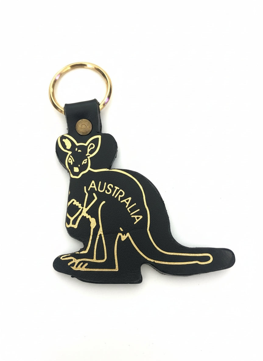 Black keychain with gold kangaroo design and 'Australia' text on a white surface
