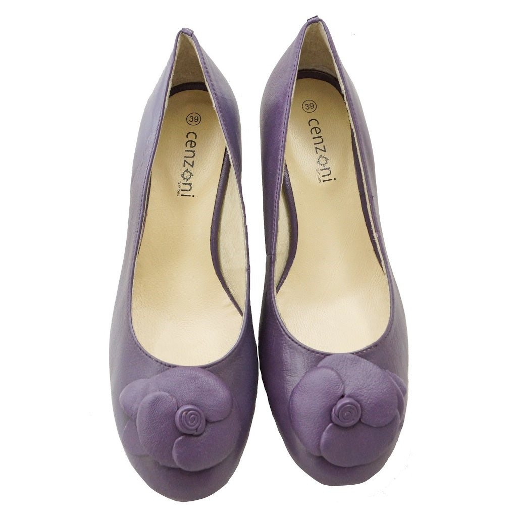 A pair of purple ladies' heels with a floral design on the top
